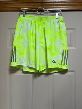 Adidas own the run all over print shorts.